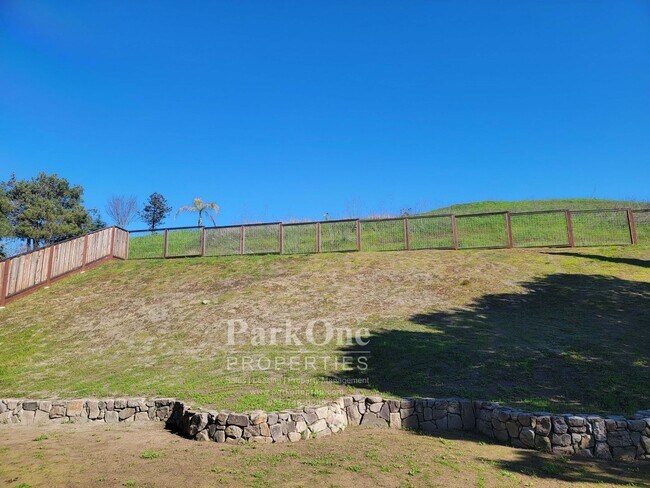 Building Photo - Spacious Updated Home with Expansive Private Yard