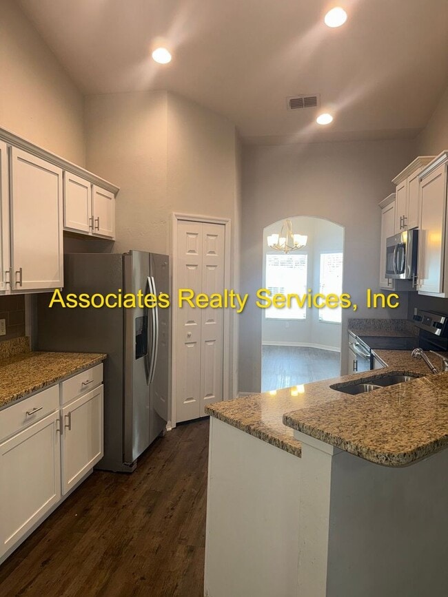 Building Photo - Spacious 4-Bedroom Home with Office in Portofino!  LOOK!