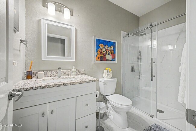 Building Photo - 9026 W Escuda Dr