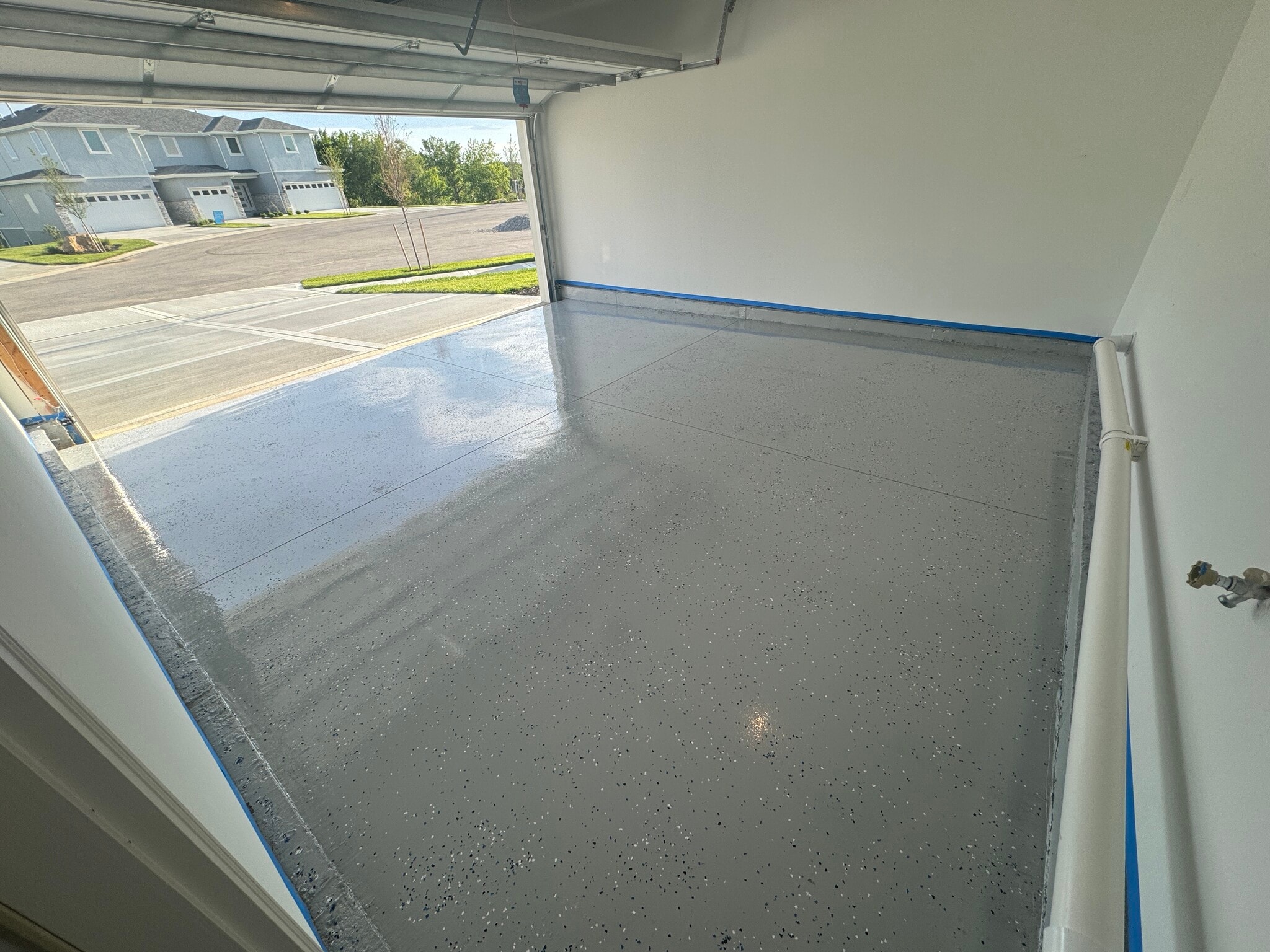 Epoxy double car garage - 22914 W 72nd Ter