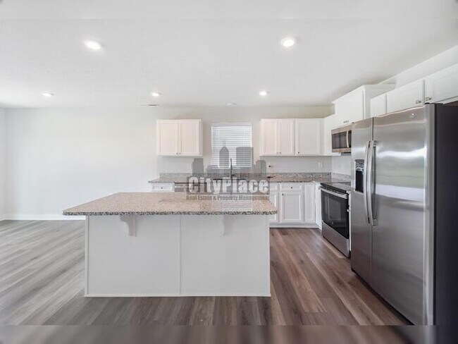 Building Photo - 7009 E Bean Blossom Dr