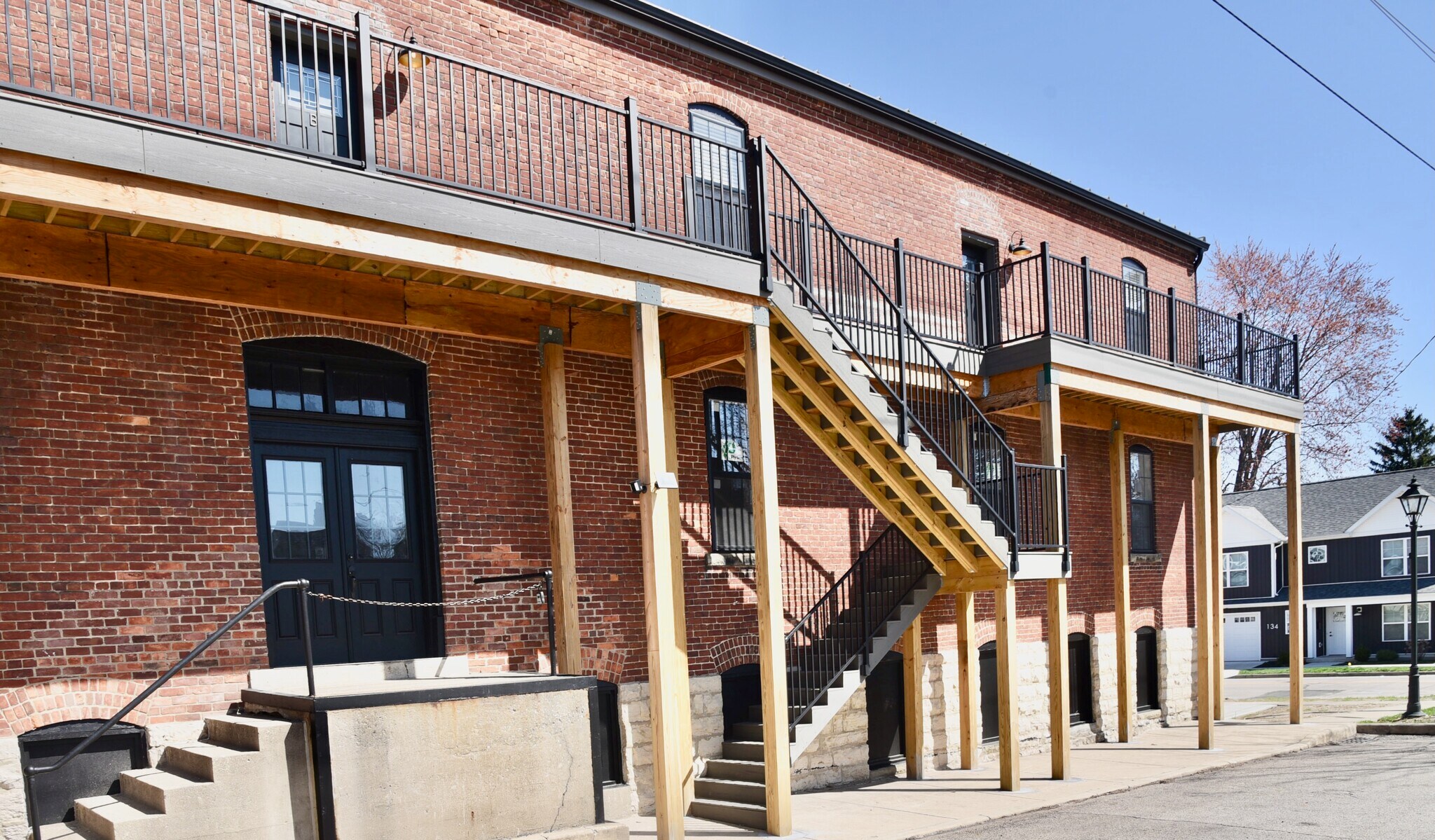Parking spaces for up to two vehicles and private staircase accessibility - 101 W Broadway St