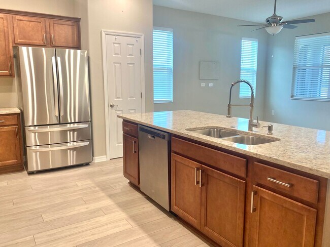 Building Photo - Three Bedroom Home In Gated 55+ Exclusive ...