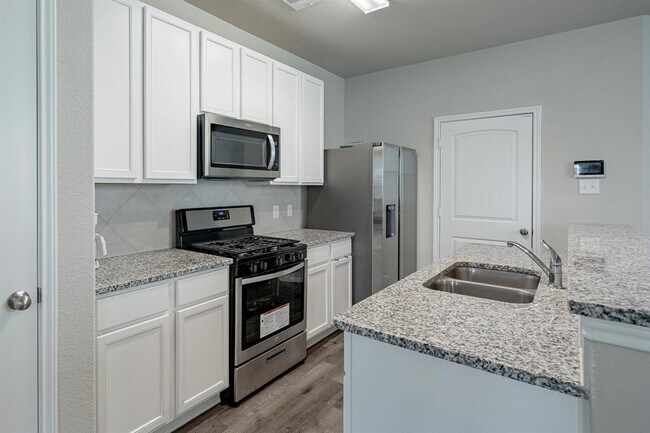 Building Photo - 4923 Blue Jacaranda Wy
