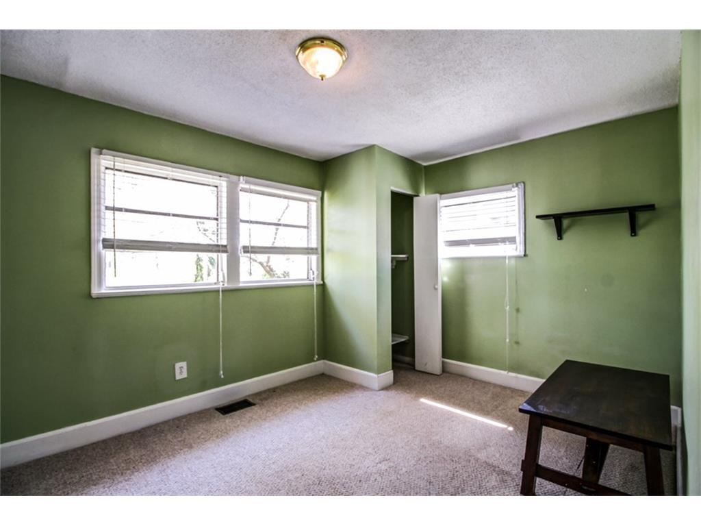 3rd bedroom or office. Paint is currently sandy brown. - 182 2nd Avenue Southeast