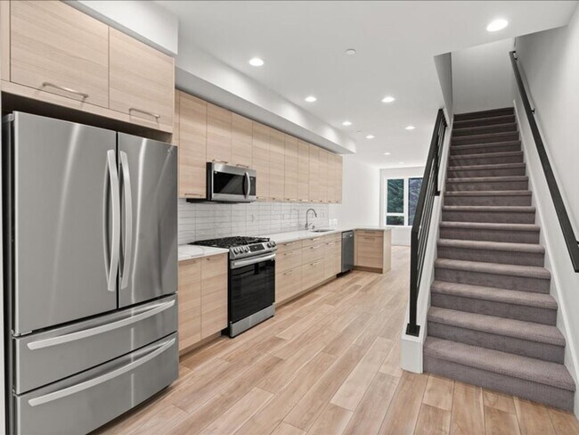 Building Photo - Beautiful Greenwood Townhome with Rooftop ...