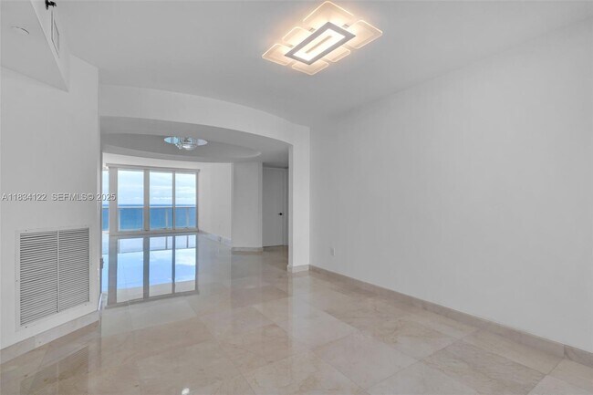 Building Photo - 19333 Collins Ave