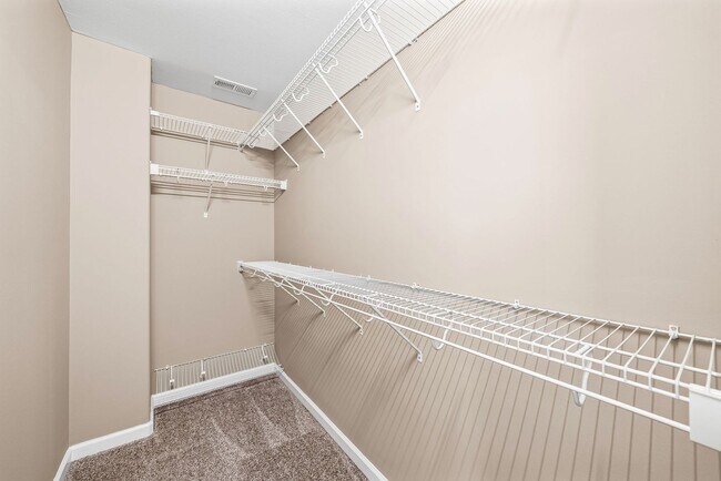 Building Photo - Four Bedroom with Three Car Garage!