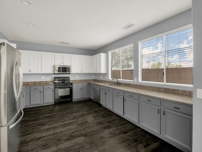 Building Photo - 3-bedroom, 3-bathroom 2212 home