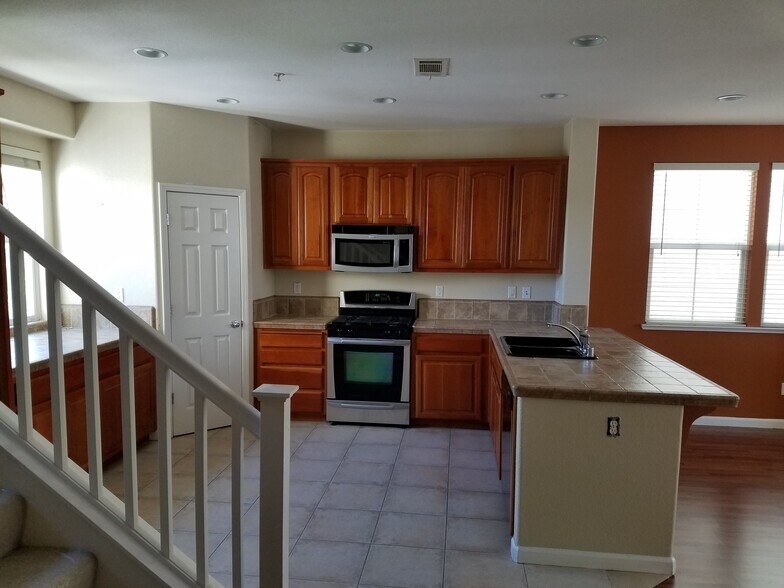 A large and spacious modern kitchen and with a brand new refrigerator. - 2878 Hilltop Mall Road