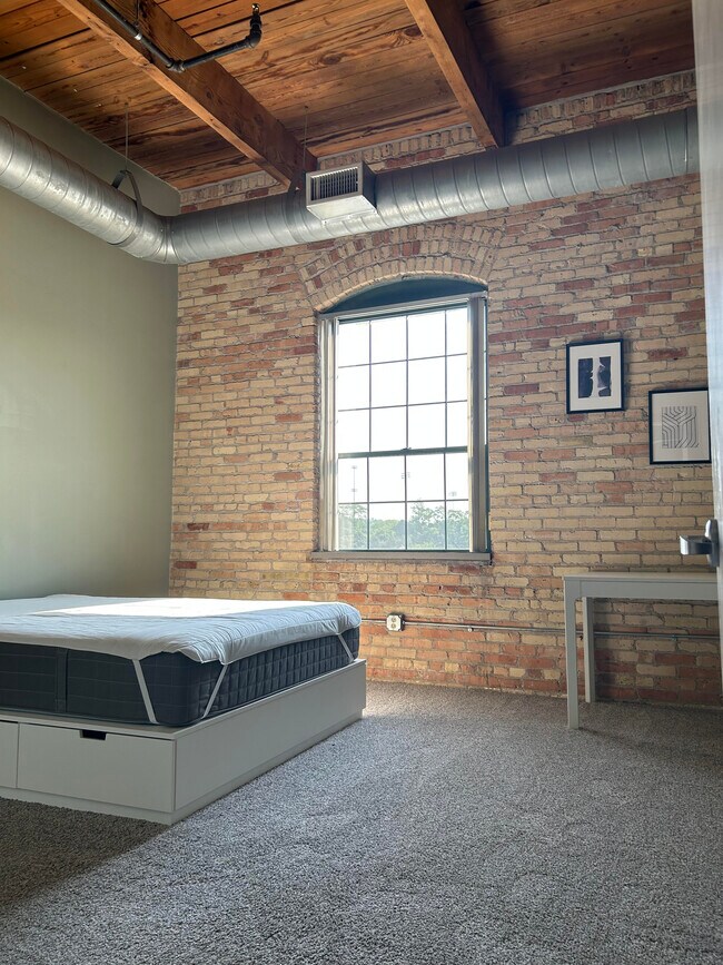 Bedroom with lots of light! - 940 Monroe Ave NW