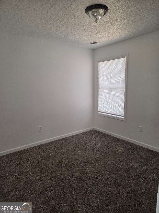 Building Photo - 7146 Ravenwood Ln