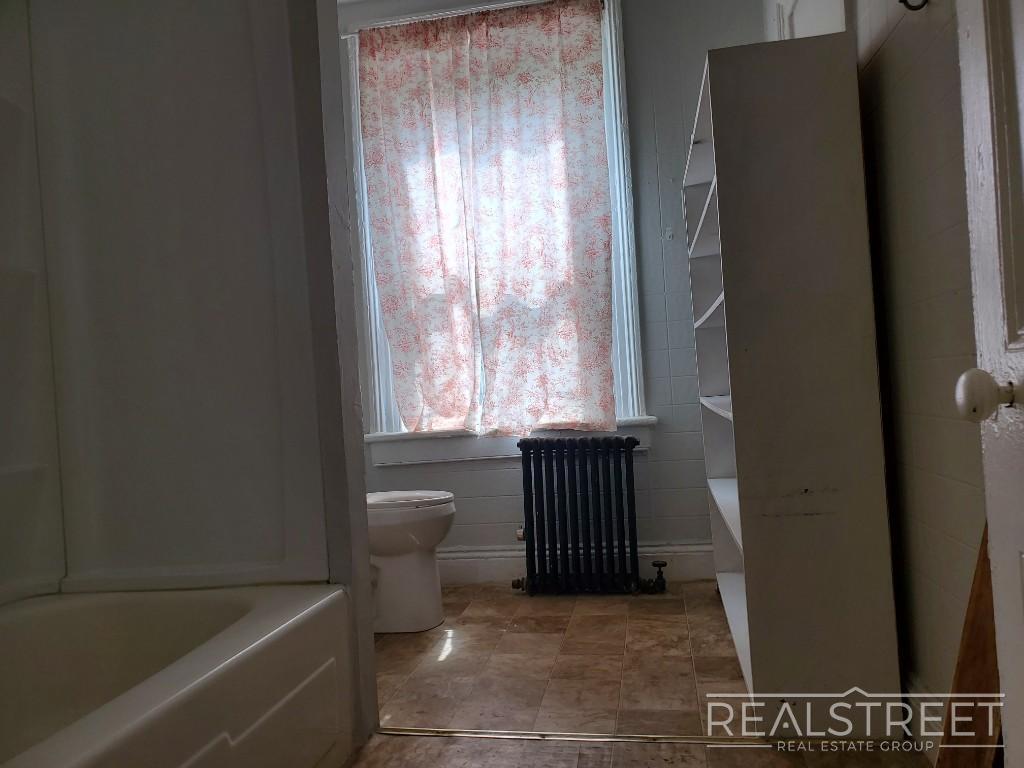 Building Photo - Huge Floor-Through 1 Bedroom with Private Backyard