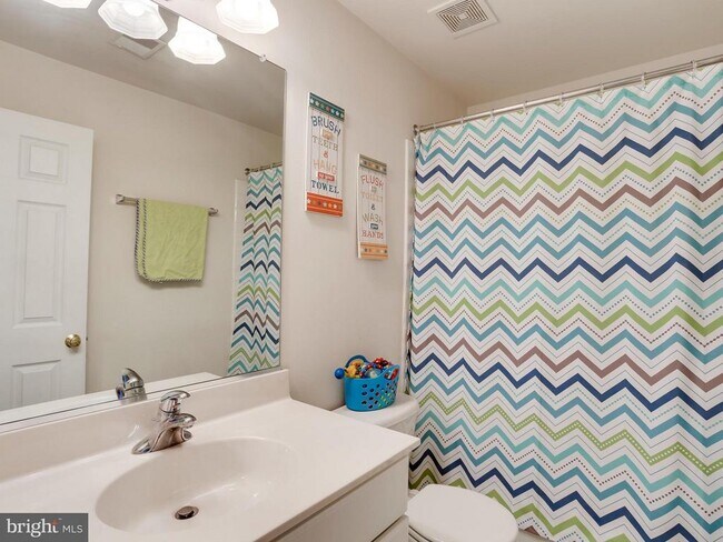 Building Photo - 8250 Red Carnation Ct