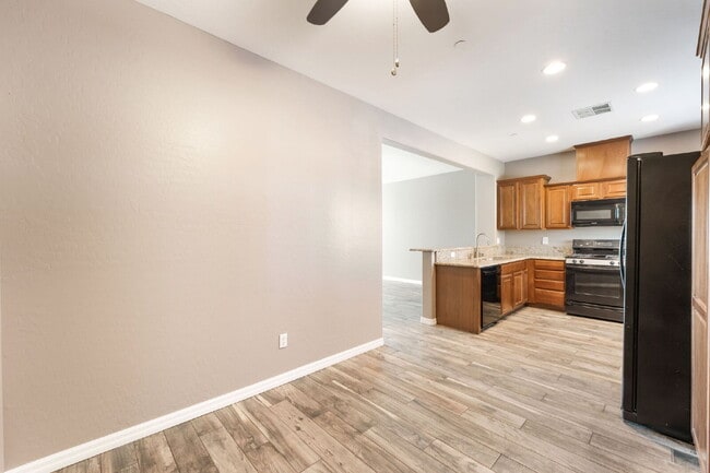 Building Photo - 3 bedroom, 2.5 bathroom Home with a 2 car garage  in  a Gated Community!