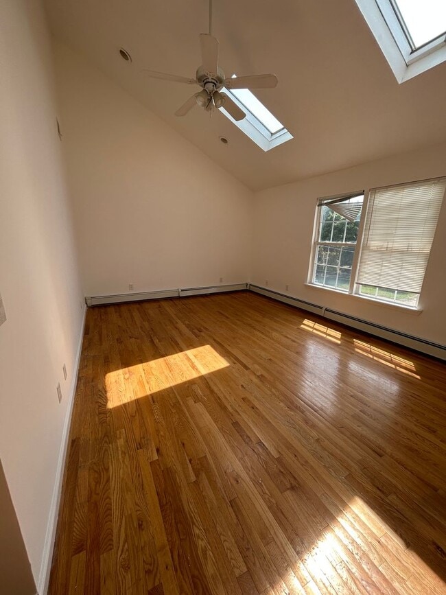 Building Photo - Discover Your Dream Home in Neptune: Spacious 4-Bedroom, 2.5-Bath with Private Backyard and Drive...
