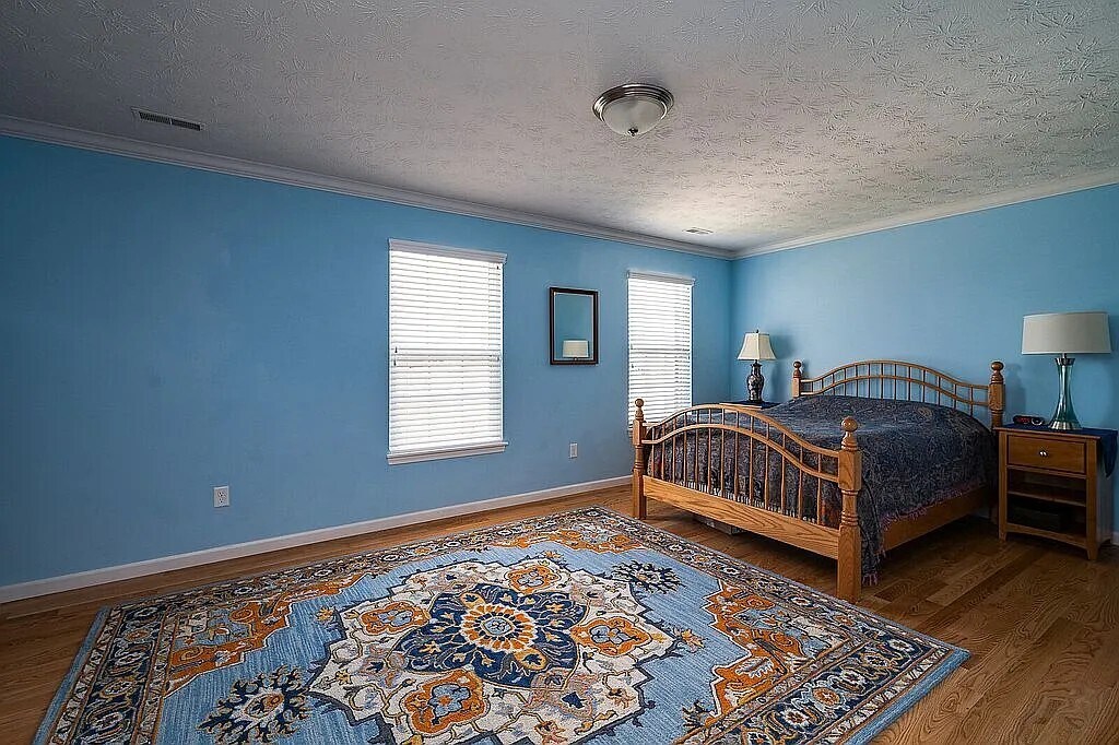 Master bedroom--that's a king bed. Note, bedroom is now painted neutral grey - 1238 Freedom Pt