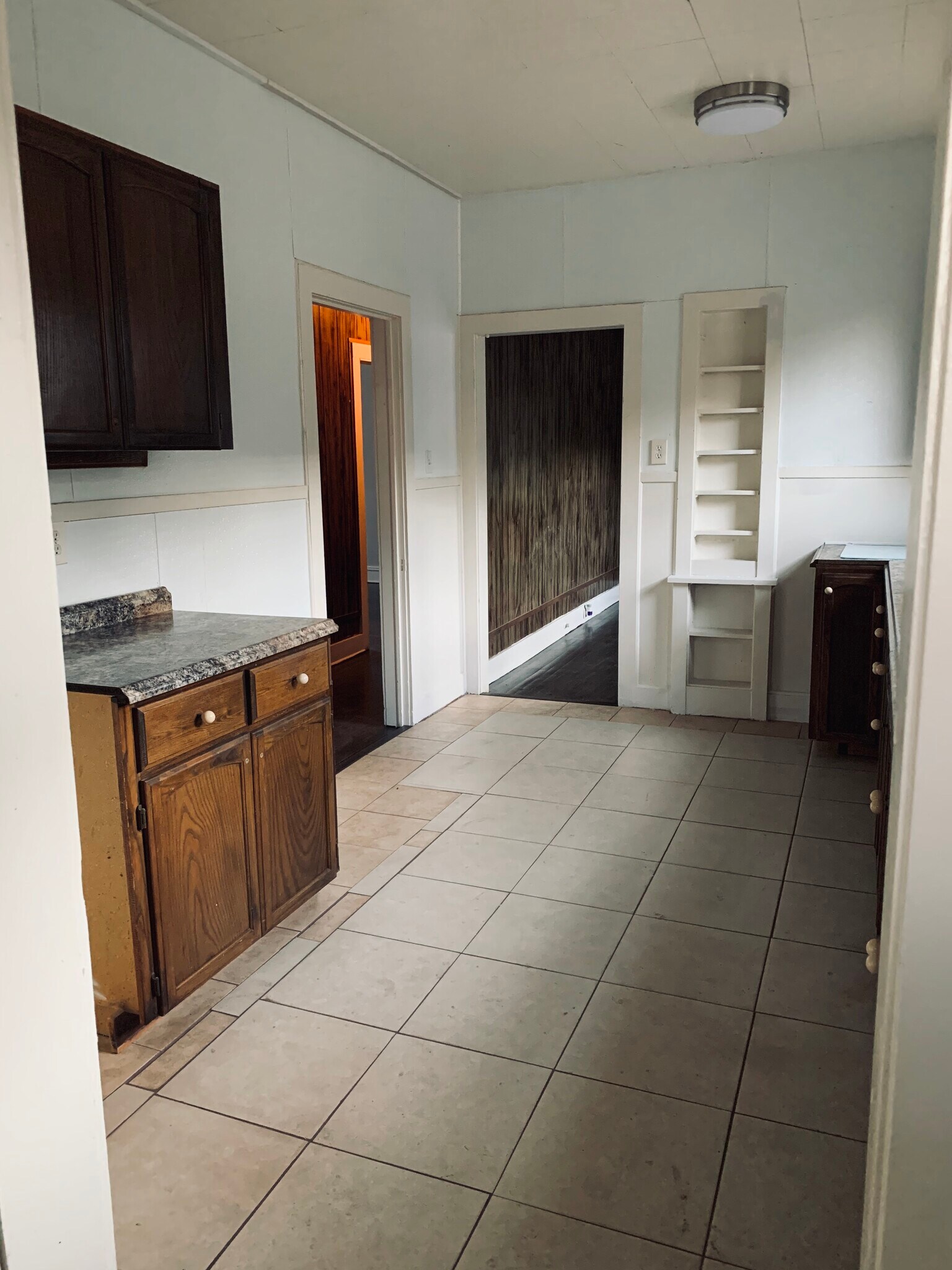 Tile kitchen floor - 1041 W Kings Hwy