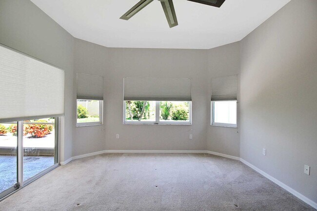 Building Photo - Annual rental: Spacious 3BR/2BA Creekwood Home with Office, Screened Lanai, EV Charger & Resort-S...