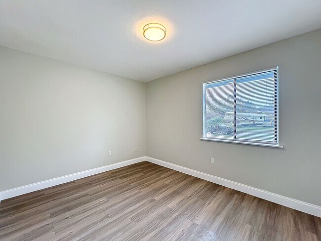 Building Photo - Stunning Waterfront Home located in the de...