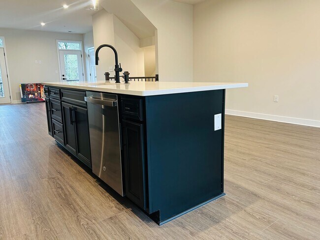 Building Photo - New Construction • 4 BR • 2 Full / 2 Half BA • End Unit Townhome in Village Town – Fayetteville’s...