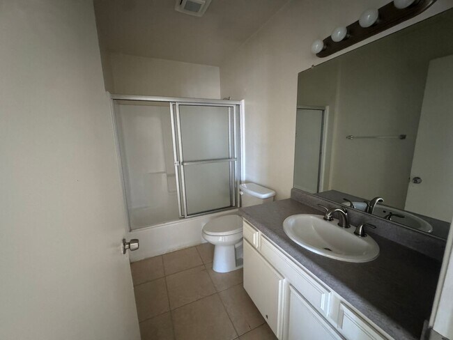 Building Photo - $2,395! Spacious Upstairs 2 Bedroom, 2 Bathroom Apartment with 2-Car Garage! 90710