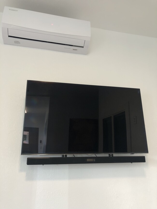 Wall-Mounted TV - 115 N San Gabriel Blvd