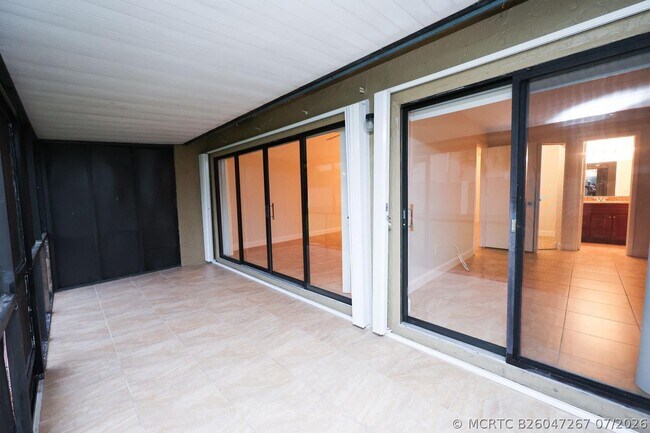 Building Photo - 10127 Boca Bend E