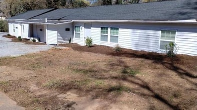 Building Photo - TRI-PLEX