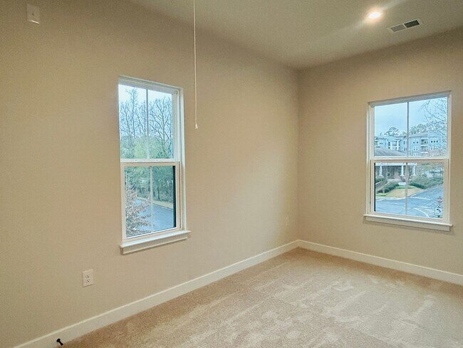 Building Photo - New Construction • 4 BR • 2 Full / 2 Half BA • End Unit Townhome in Village Town – Fayetteville’s...