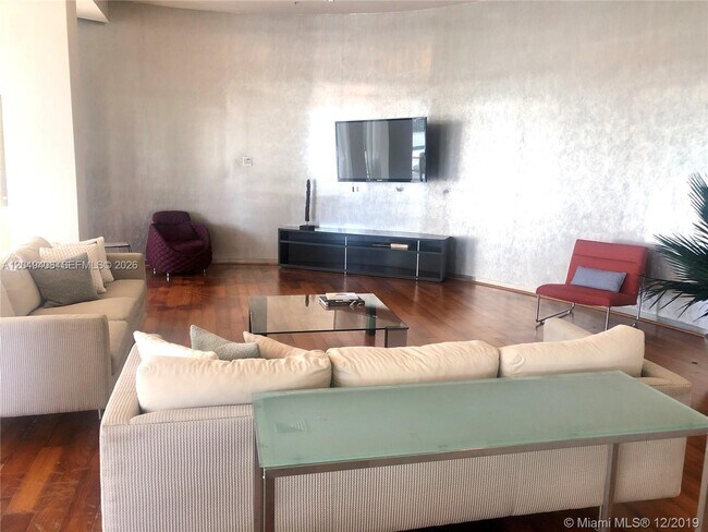 Building Photo - 10275 Collins Ave