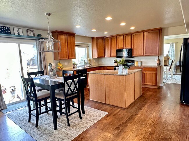 Building Photo - Elegant & Spacious 4BD Home with 3-Car Gar...