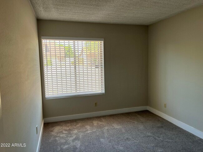 Building Photo - 7827 W College Dr