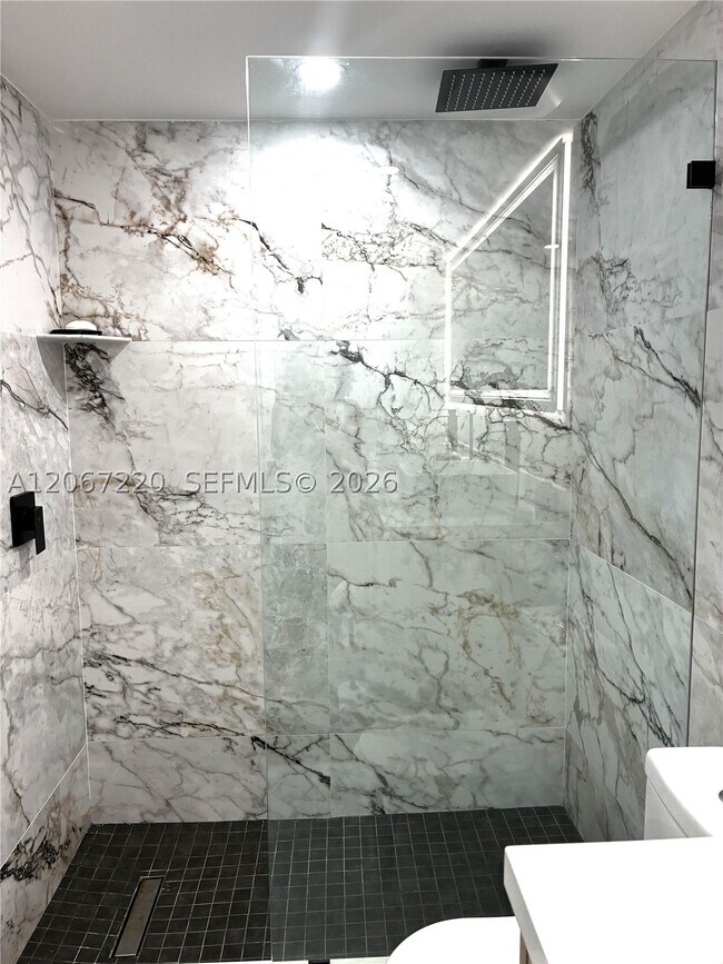 Building Photo - 6917 Collins Ave