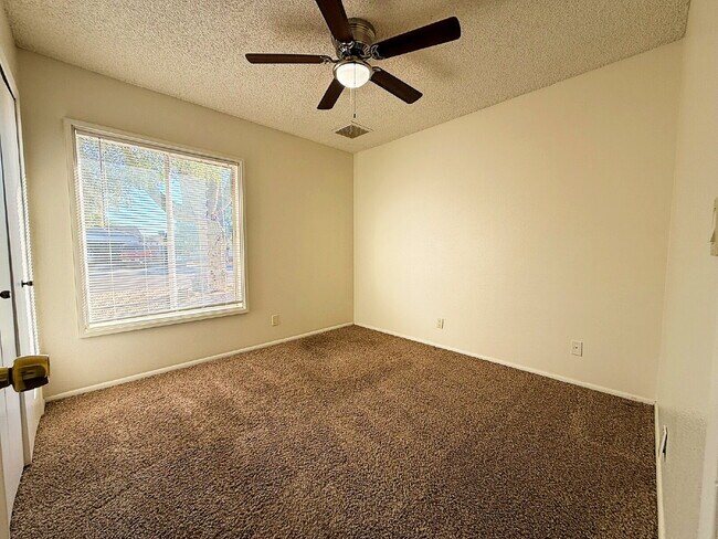 Building Photo - "Charming 3-Bedroom Oasis in Goodyear - Sp...