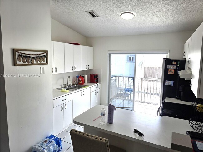 Building Photo - 7777 W 29th Ln