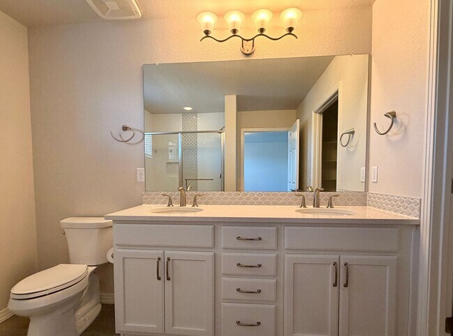 Building Photo - Move-In Ready 3-Story Townhome with Loft & 2-Car Garage