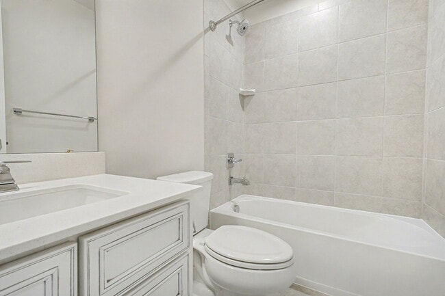 Building Photo - **Special Move-in Offer**  $500 off of the first month's rent.  Exceptional 3-Level Corner Unit T...