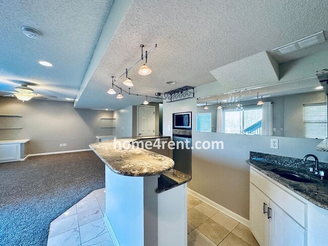 Building Photo - Gorgeous, Updated Home w/ Granite Counters and Wood Floors in Kitchen, Walkout Finished Basement!