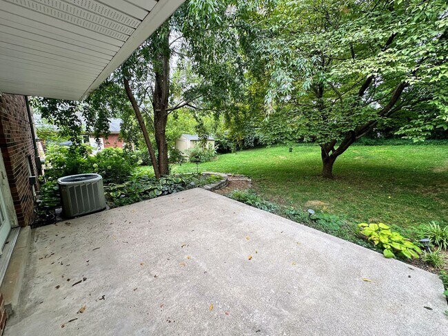 Building Photo - AVAILABLE NOW! Spacious 4 BR, 2 Bath House! Wood Floors, Attached Garage, W/D Included