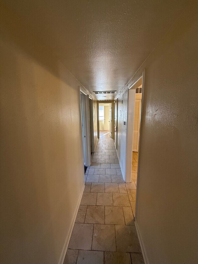 Building Photo - 4 bed , 1.5 bath , inside laundry, fenced yard, ceramic flooring throughout!