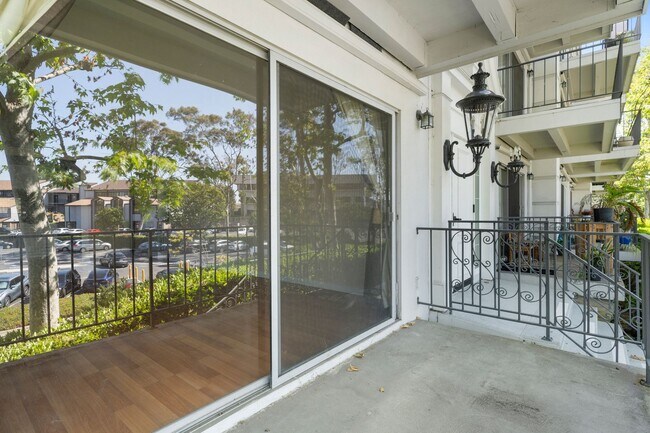 Building Photo - Available now! Updated Versailles Condo in Newport Beach