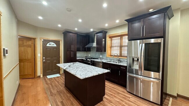 Building Photo - 5716 N Campbell Ave