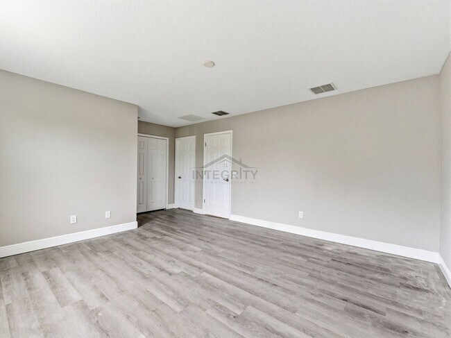Building Photo - 8947 Garden Party Dr