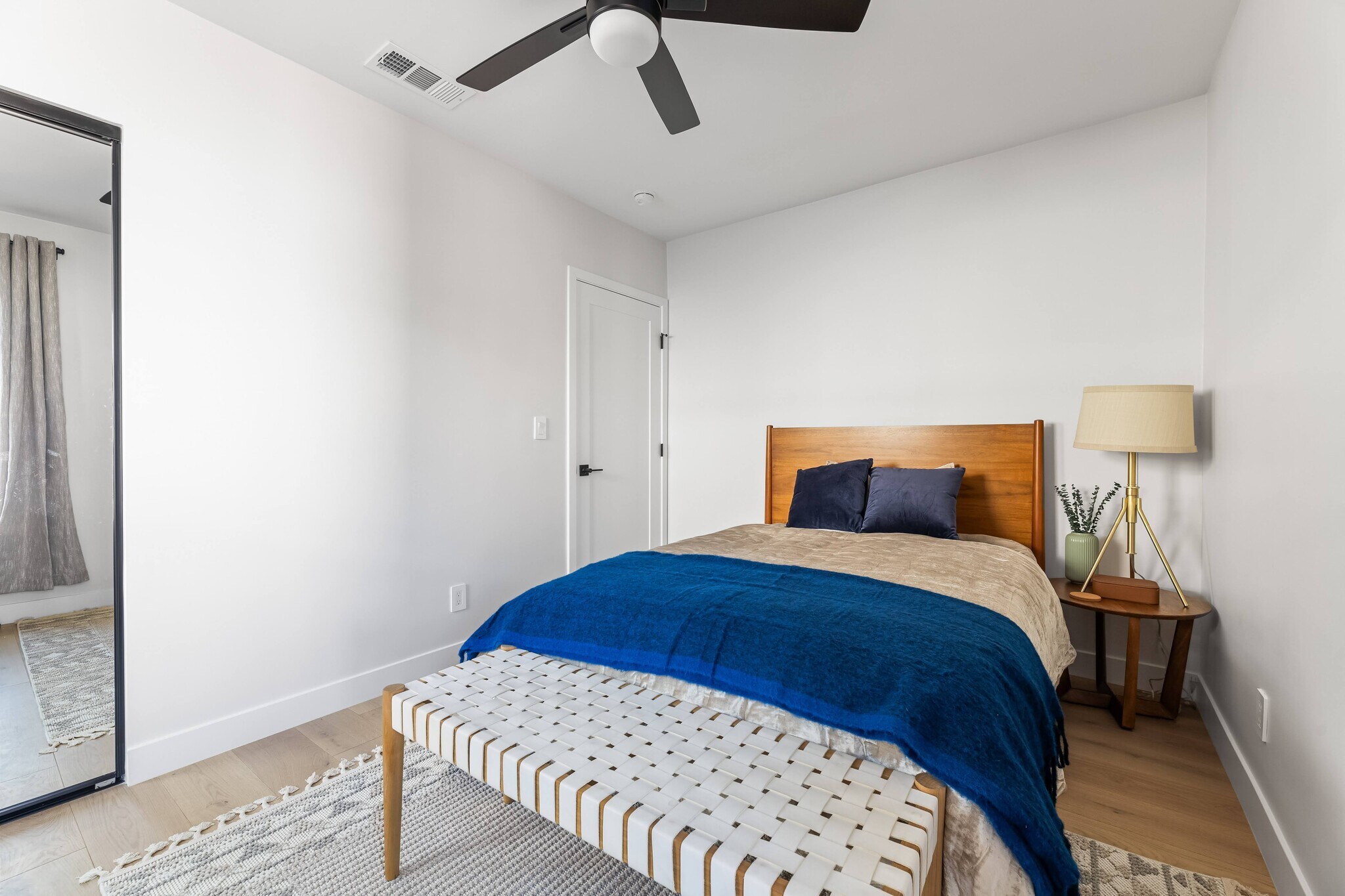 2nd bedroom with large closet, West Elm furniture, and flat screen TV. - 1823 N Ditman Ave