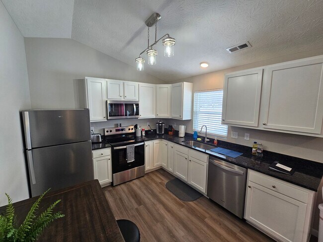 Building Photo - Vroooom . . . . the ROAD is calling. . . .Fully furnished themed rental includes all utilities an...