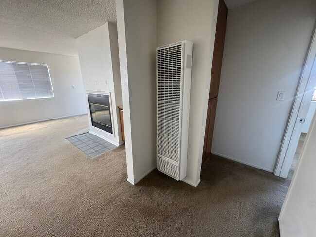 Building Photo - $2,395! Spacious Upstairs 2 Bedroom, 2 Bathroom Apartment with 2-Car Garage! 90710