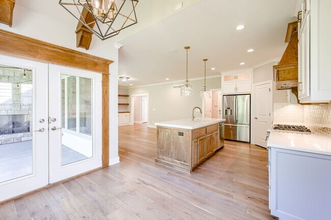 Building Photo - {4620} James Engle Custom Home built in 2019 + Main Floor Primary Bedroom + Finished Basement wit...