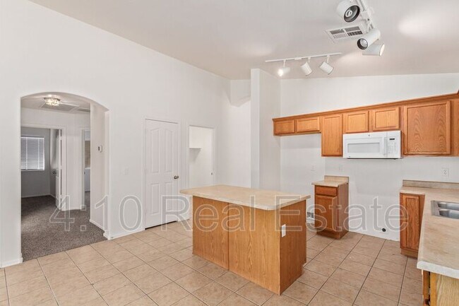 Building Photo - 36537 W El Greco St