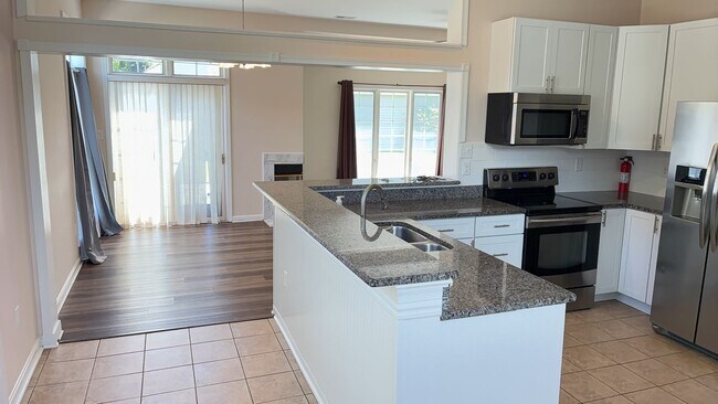 Building Photo - Nice Three-bedroom Two Car Garage corner lot